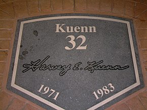 A dark granite plaque inscribed with white text reading, "Kuenn, 32, 1971, 1983" along with the facsimile signature of Harvey Kuenn