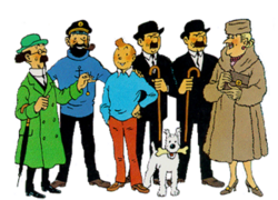 Tintin is standing in a group amongst the main characters of the comics series.