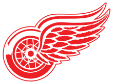 Logo des Red Wings représentant une roue ailée rouge.