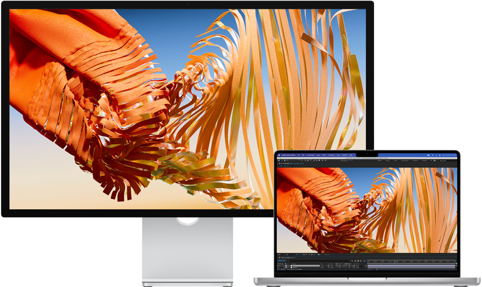 Das MacBook Pro neben dem Studio Display