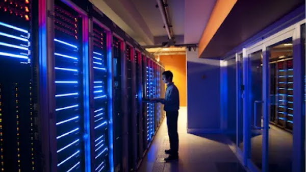 Man checking the data center connections