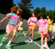 Navigate the gallery to a video about Children on a tennis court