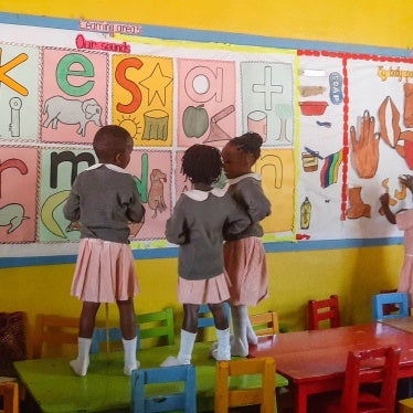 4 girls in a school classroom 