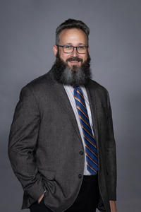 Headshot of Michael Huber, Bronze Award Winner