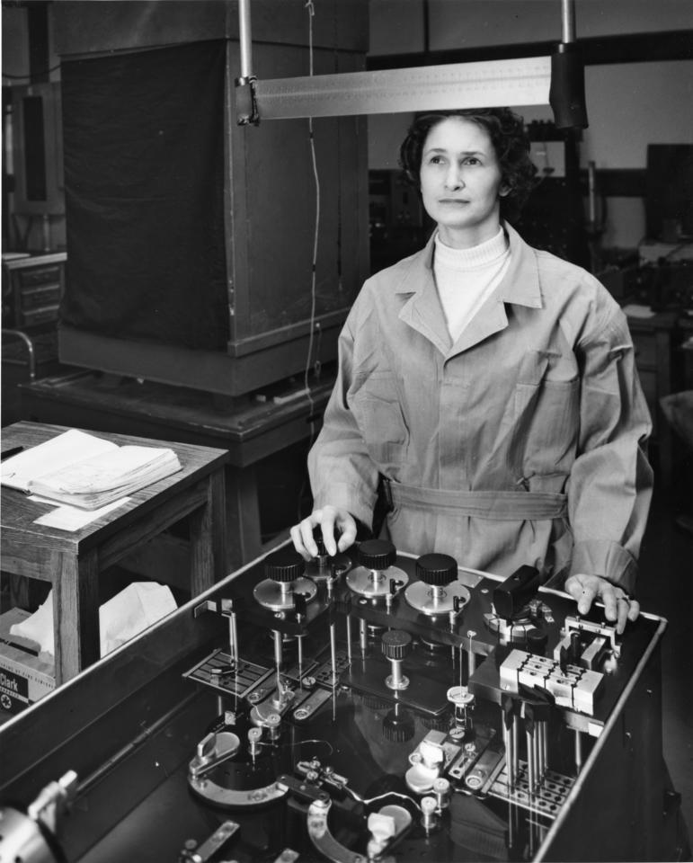 A NIST scientist in front of a Wenner Bridge