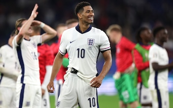 Jude Bellingham celebrates victory after the group stage match between Serbia and England at Arena AufSchalke