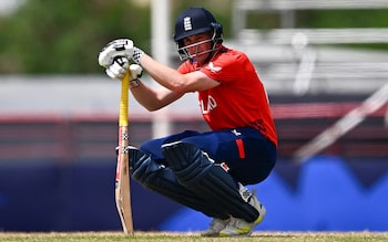 Harry Brook on kneels down whilst batting