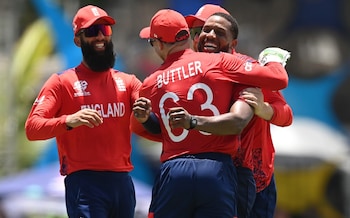 Jos Buttler and Chris Jordan celebrate