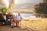 Equity release calculator 2023, older woman in coat with coffee