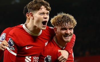 Harvey Elliott (right) celebrates scoring Liverpool's fourth goal with James McConnell 