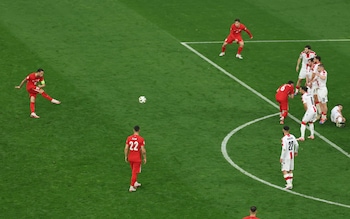 Hakan Calhanoglu strikes a free-kick