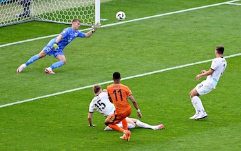 Netherlands' Cody Gakpo scores their first goal