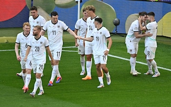 Austria's midfielder #09 Marcel Sabitzer celebrates scoring his team's third goal with his teammates