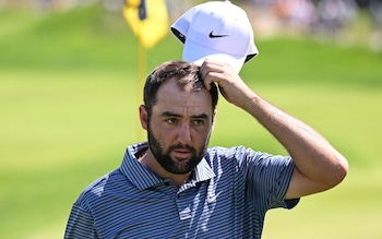 Scottie Scheffler walks off the 18th green during the final round of the 2024 US PGA Championship