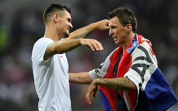 Dejan Lovren and Mario Mandzukic embrace after England vs Croatia