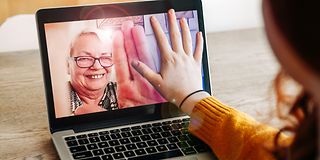 Video call between grandmother and grandchild.