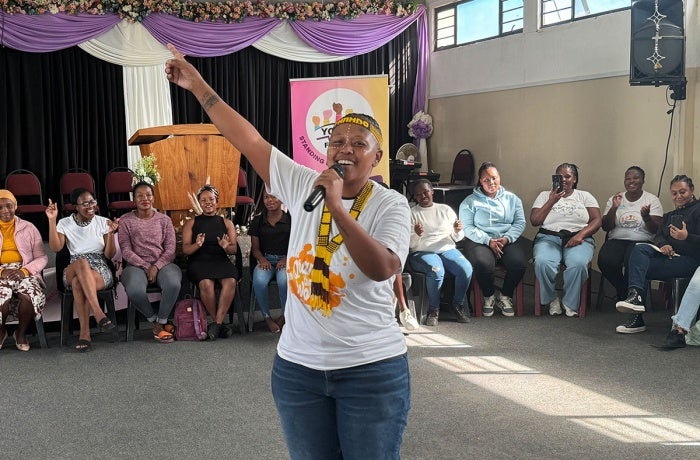 Thando, 32, performing popular songs. 