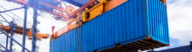 View Of Commercial Dock with containers Against Sky 