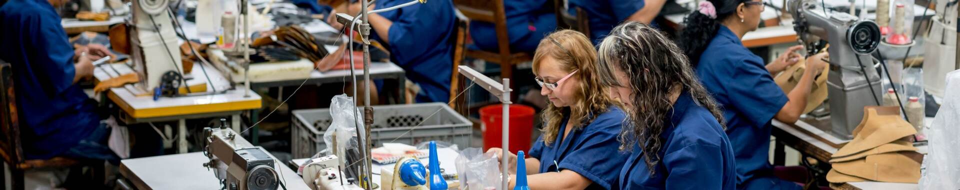 Manual workers working at a factory.