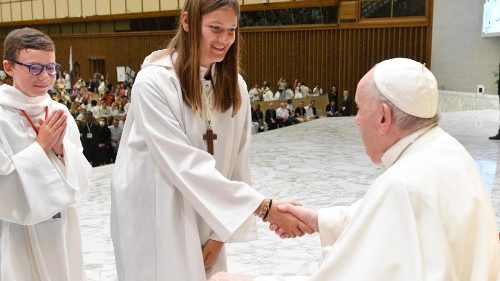 Pope Francis with altar servers in 2022