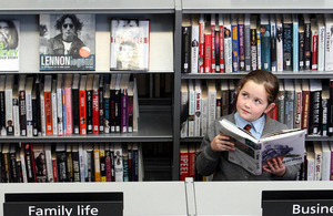 Girl reading in a library