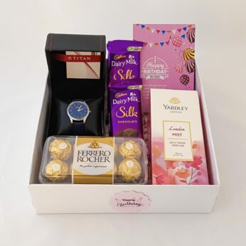 Best gift for sister birthday in India with stylish watch, Chocolate and a sweet greetings.