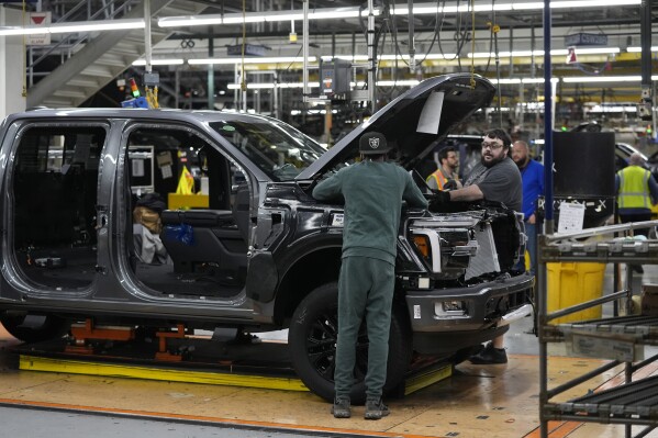 FILE - A 2024 Ford F-150 truck is assembled at the Dearborn Truck Plant, Thursday, April 11, 2024, in Dearborn, Mich. On Thursday, May 30, 2024, the Commerce Department issues its second estimate of how the U.S. economy performed in the first quarter of 2024. (AP Photo/Carlos Osorio, File)
