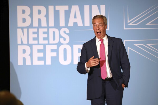 Reform UK Leader Nigel Farage speaks at a meeting while on the general election campaign trail, in Boston, England, Thursday June 27, 2024. (Paul Marriott/PA via AP)