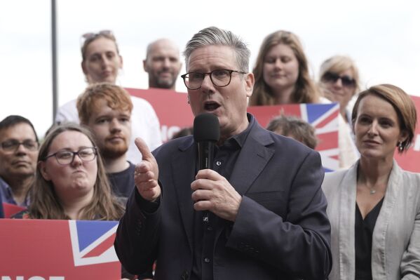 British Labour Party leader Sir Keir Starmer speaks to party supporters in Bollington, England, while on the General Election campaign trail, Thursday June 27, 2024. (Stefan Rousseau/PA via AP)