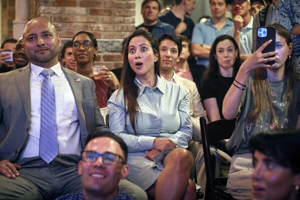 Trump supporters react during the Young Republicans' Presidential debate watch party, June 27, 2024, in New York as President Joe Biden faces former President Donald Trump during the first Presidential debate ahead of the 2024 elections. (AP Photo/Andres Kudacki)