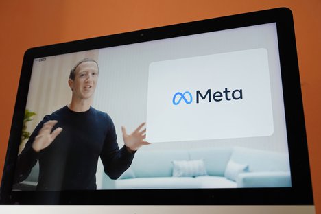 Seen on the screen of a device in Sausalito, Calif., Facebook CEO Mark Zuckerberg announces their new name, Meta, during a virtual event on Thursday, Oct. 28, 2021