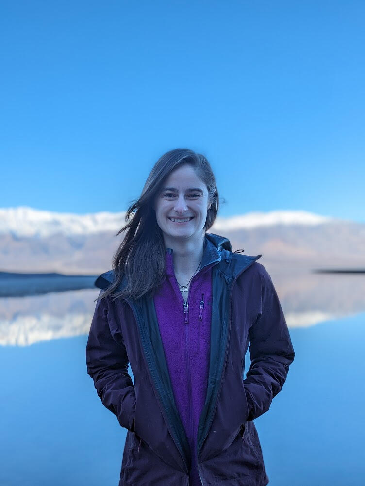 Madison Douglas in front of the lake in Death Valley