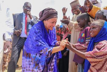 United Nations Deputy Secretary-General Amina Mohammed meets young children at a refugee camp in Chad.