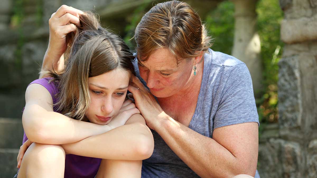 Parent consoling child