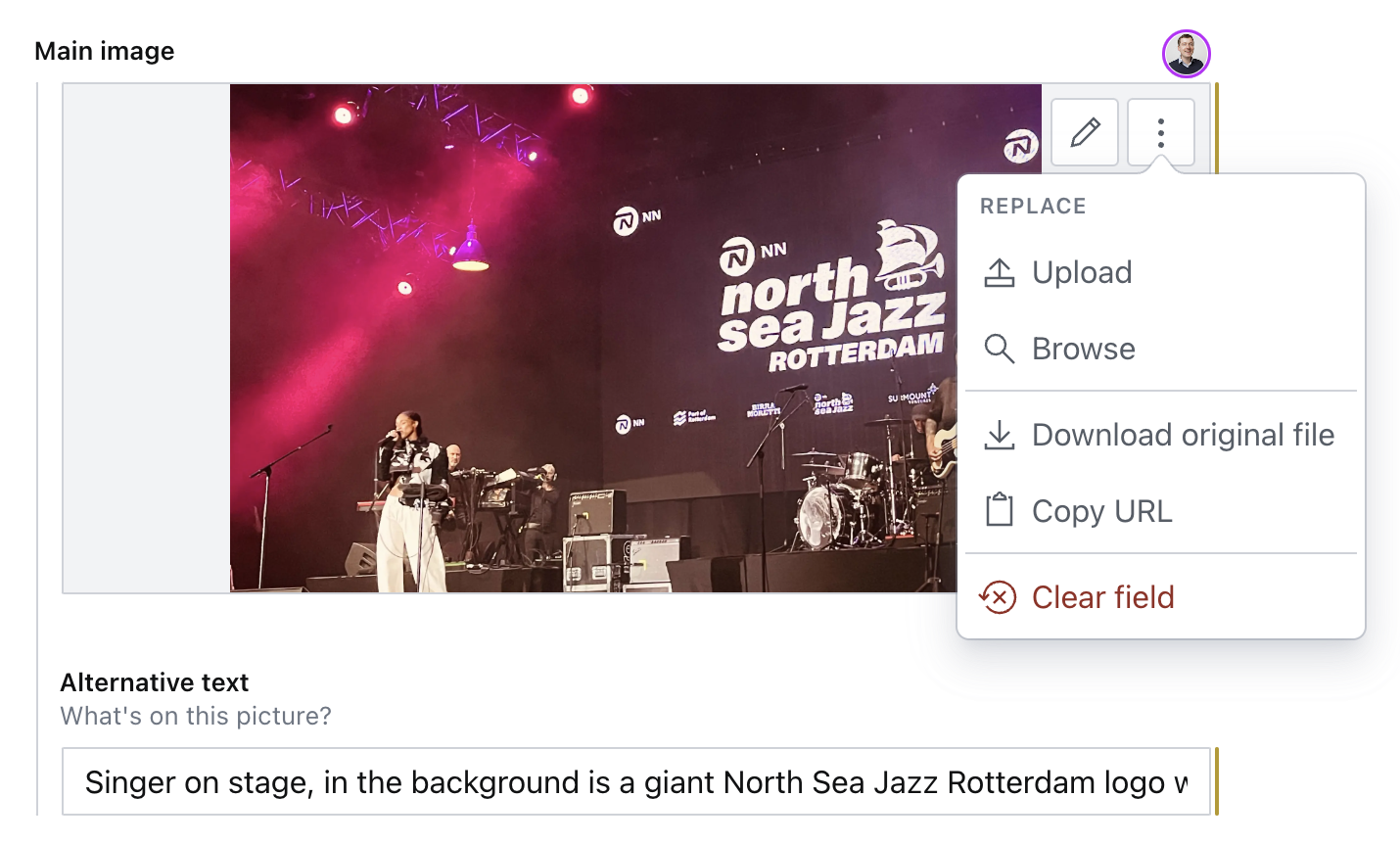 CMS image component with preview of an image and its alternative text. Next to the image is a kebab button from which a menu called Replace is expanded, with actions Upload, Browse, Download, Copy original files, Copy URL, Clear field, the last one is red