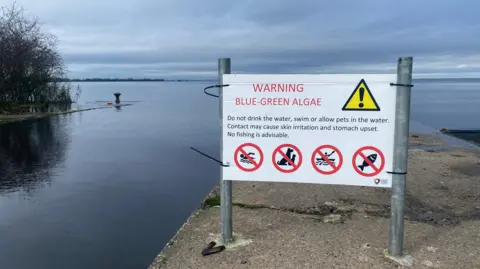 Water quality warning signs were in place at Oxford Island, Lough Neagh, last year 