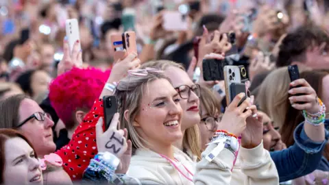 PA Media Fans at Murrayfield for Taylor Swift's concert 