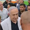 Israeli Prime Minister Benjamin Netanyahu visits the town of Majdal Sham after a rocket attack in Golan Heights