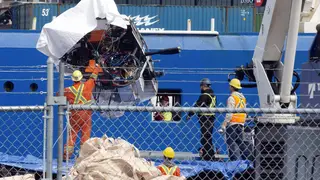 Debris from the Titan submersible, recovered from the ocean floor near the wreck of the Titanic, is unloaded from the ship Horizon Arctic at the Canadian coast guard pier in St John’s, Newfoundland