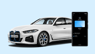 BMW i4 と、自動車用デジタルキーが表示されている Android スマートフォン。