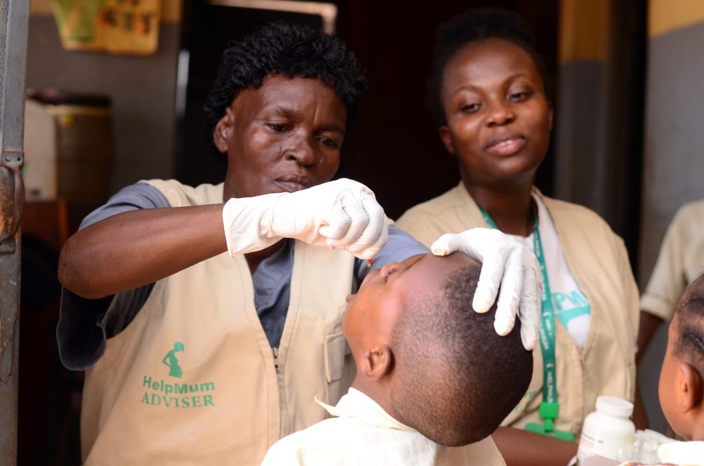 HelpMum team administering vaccines.