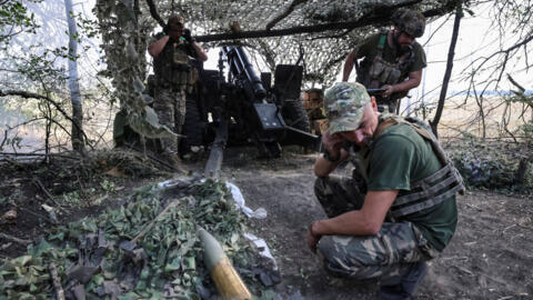 Ukrainian artillerymen fire an M101A1 howitzer towards Russian troops near Pokrovsk, in Ukraine's Donetsk region, on September 5, 2024.