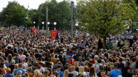 People attend a vigil for the victims of the knife attack in Southport, Britain, July 30, 2024.