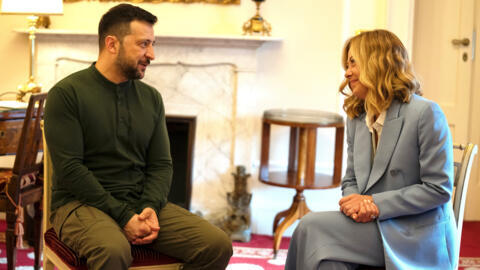 Ukrainian President Volodymyr Zelenskiy meets with Italian Prime Minister Giorgia Meloni as they attend the European House-Ambrosetti Forum, an annual conference that gathers business and political le