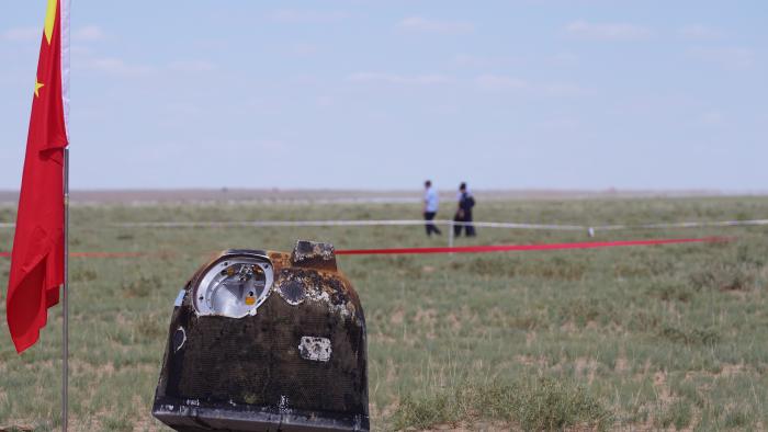 ULANQAB, CHINA - JUNE 25: The return capsule of the Chang'e-6 probe lands at the designated landing area on June 25, 2024 in Siziwang Banner, Ulanqab City, Inner Mongolia Autonomous Region of China. The returner of the Chang'e-6 probe touched down on Earth on June 25, bringing back the world's first samples collected from the moon's far side, and marking another remarkable achievement in China's space exploration endeavors. (Photo by VCG/VCG via Getty Images)