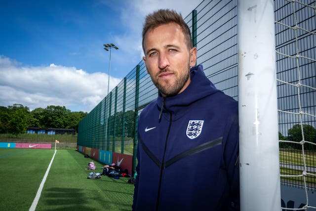 England captain Harry Kane during a visit by the Prince of Wales to St George’s Park ahead of Euro 2024 (PA)